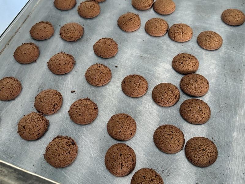 Mushroom biscuits on a baking tray at Divin Mushroom Farm